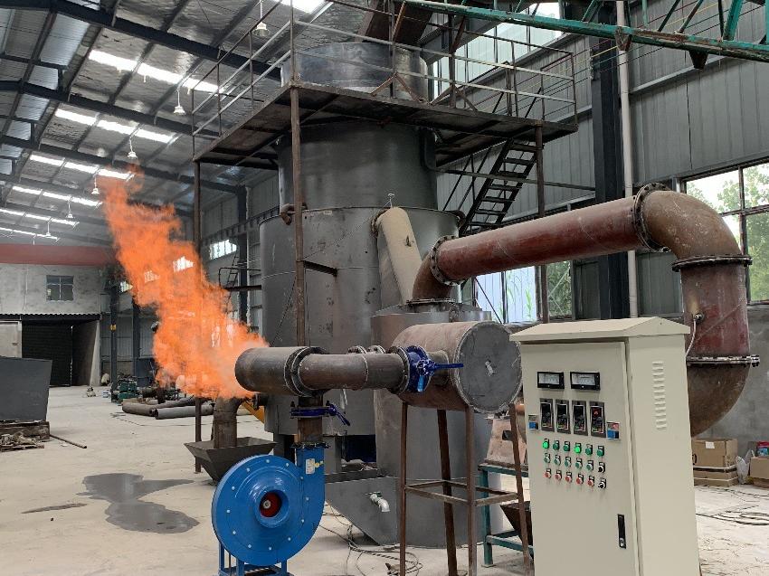 Downdraft fixed bed biomass gasifier